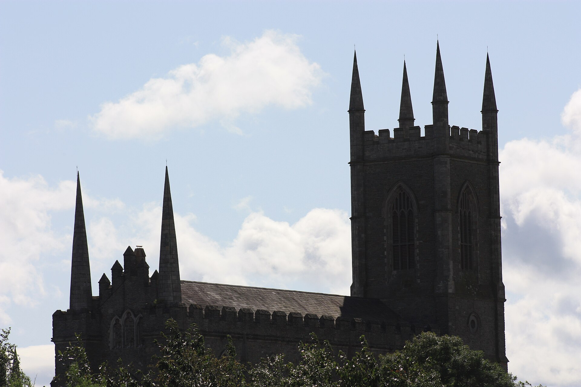 Down Cathedral in Downpatrick beneath a bright sky